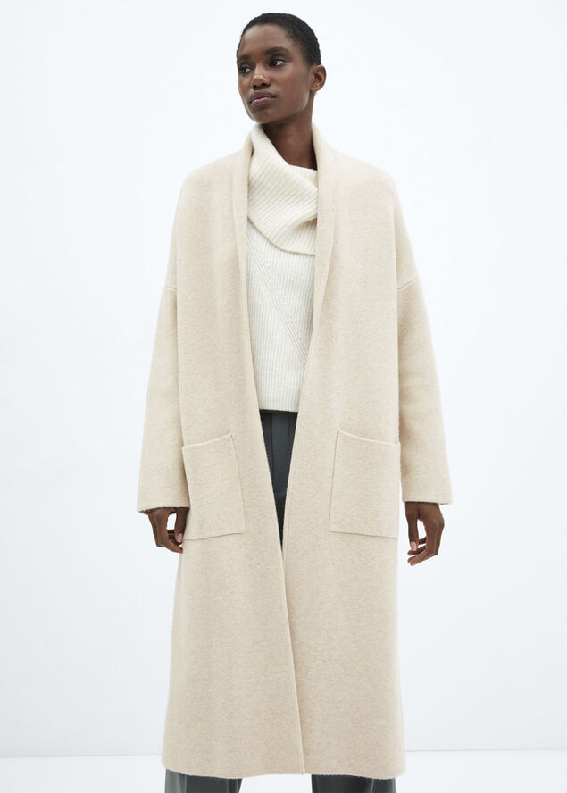 Oversized knitted coat with pockets