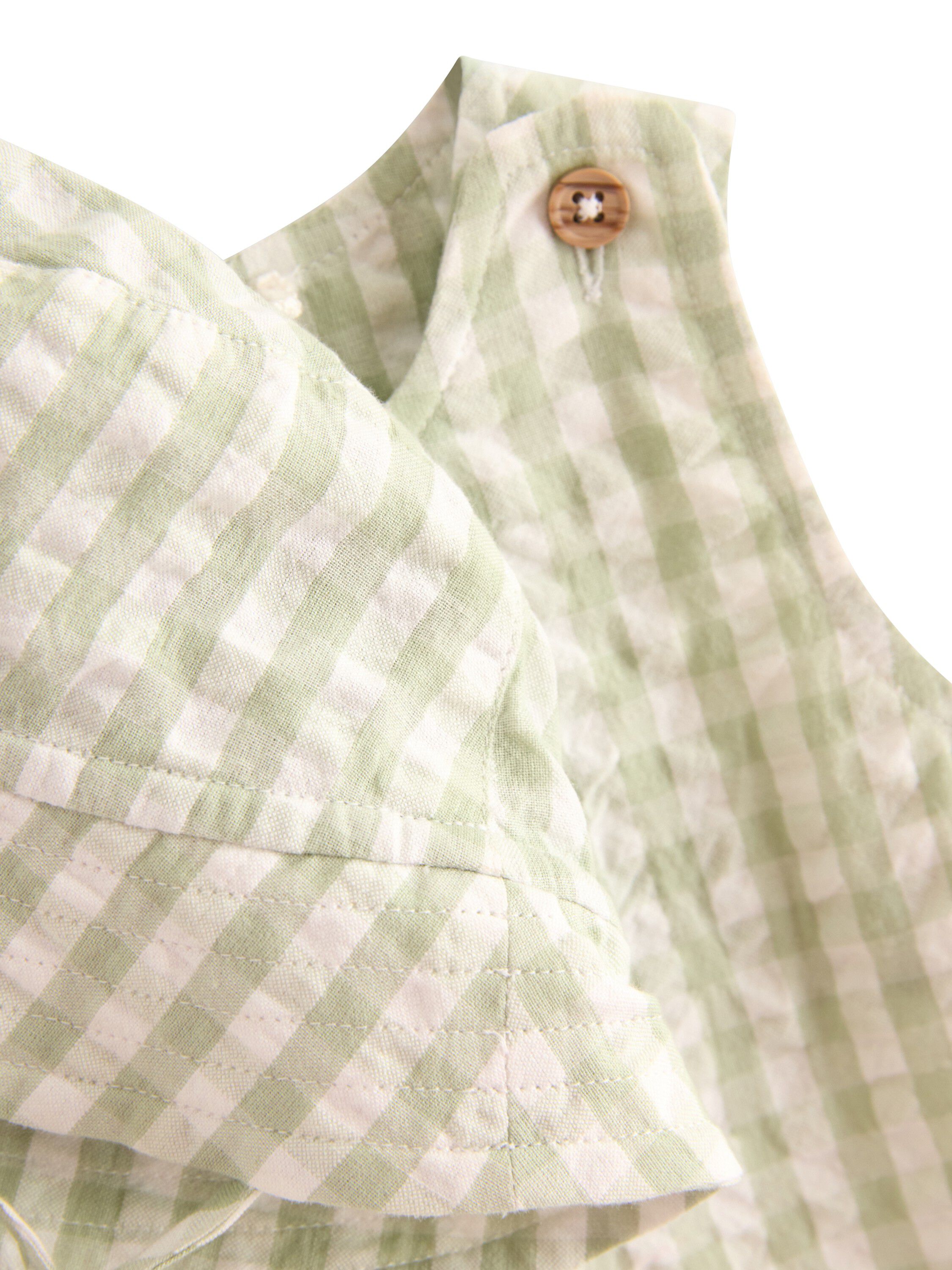 Sett i seersucker med romper og mat