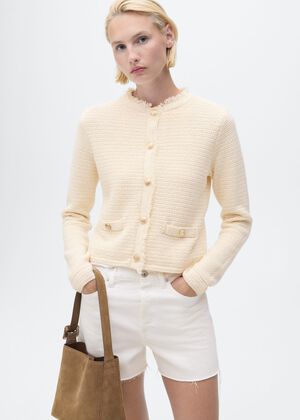 Knitted cardigan with frayed ends