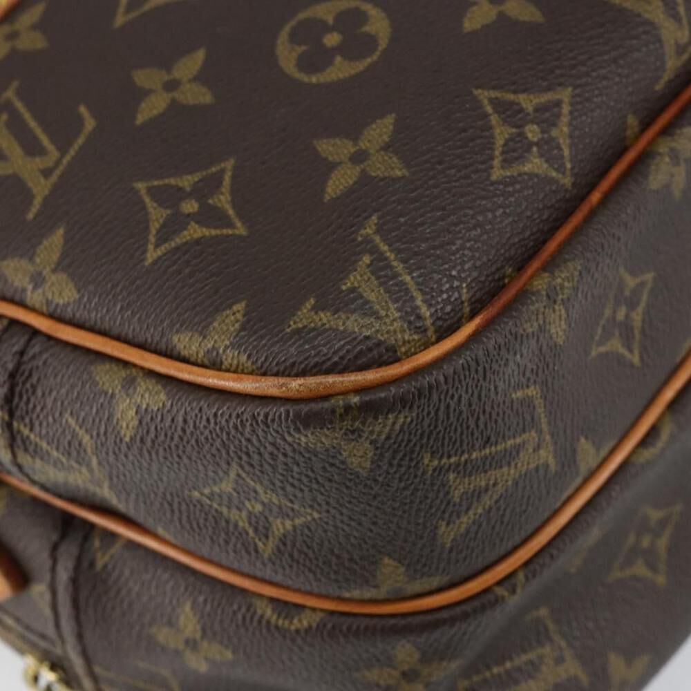 Louis Vuitton Reporter
