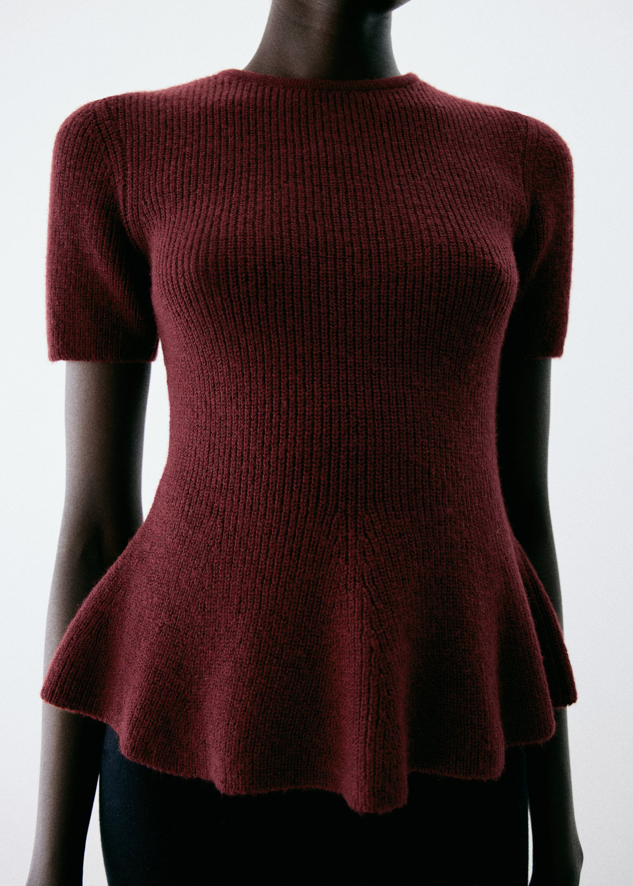 Ribbed peplum sweater