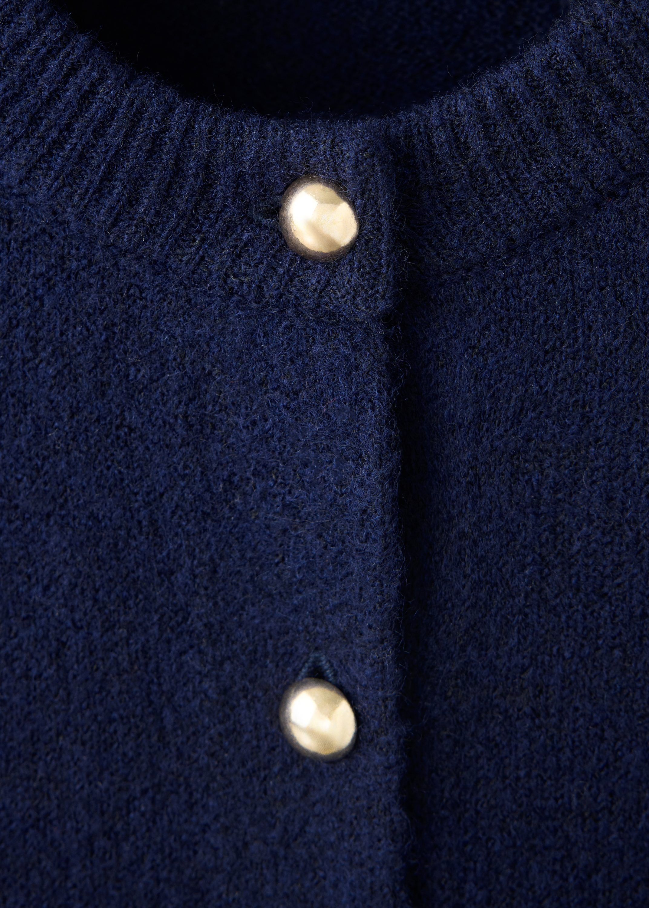 Knitted cardigan with metallic butt