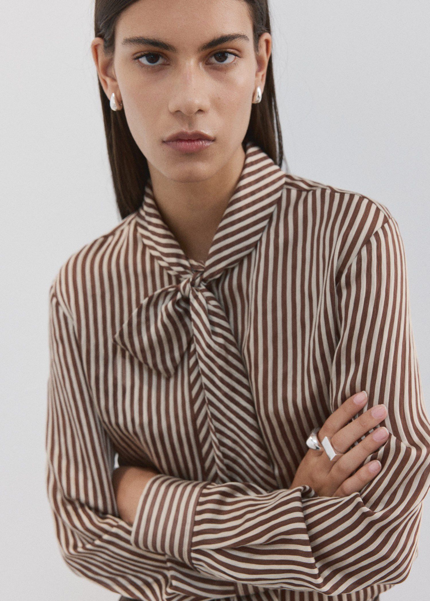 Striped blouse with bow tie neck
