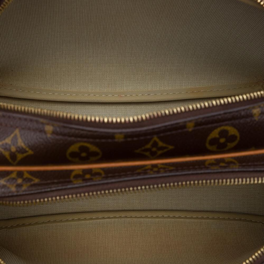 Louis Vuitton Reporter