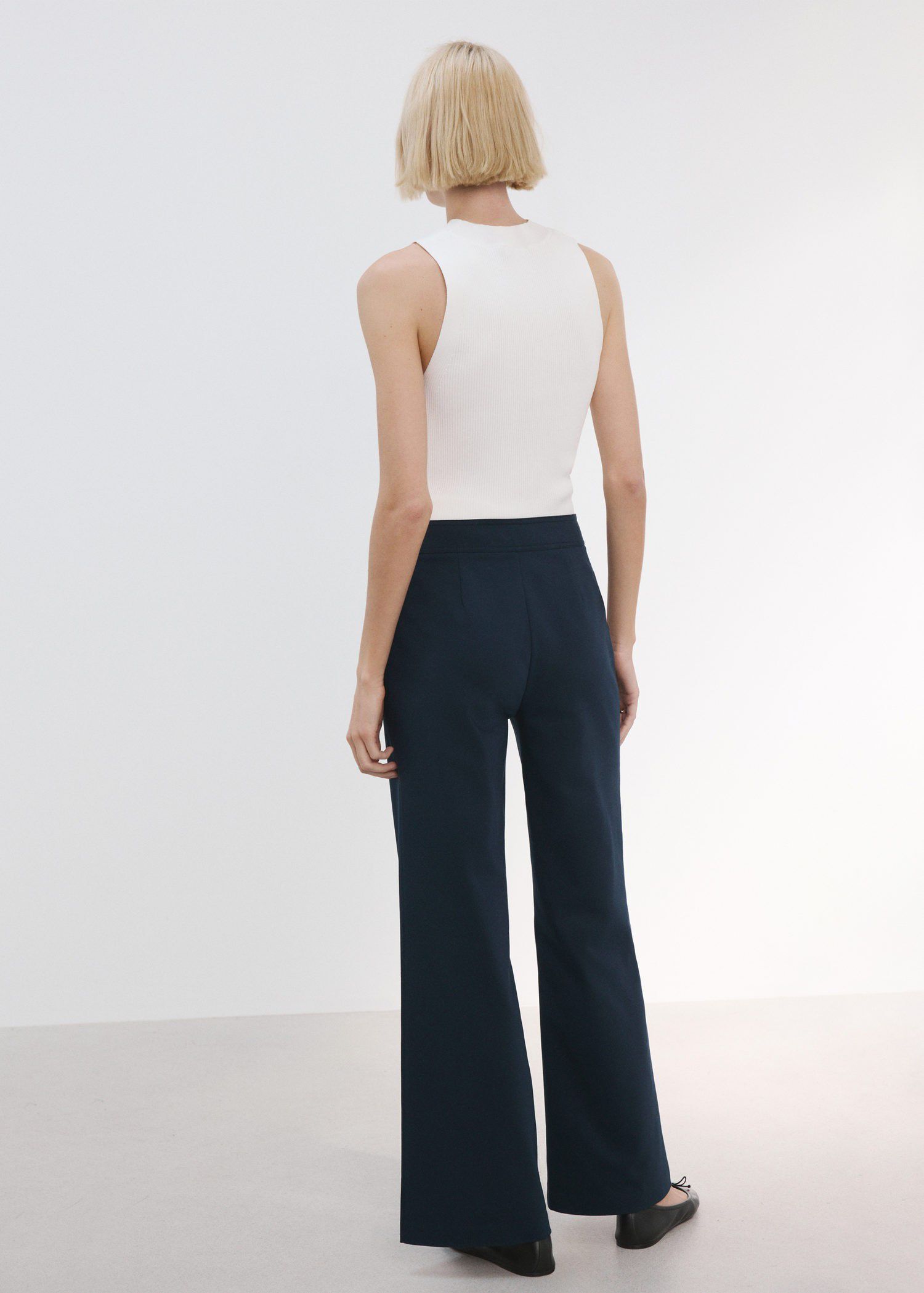 Straight trousers with jewel button