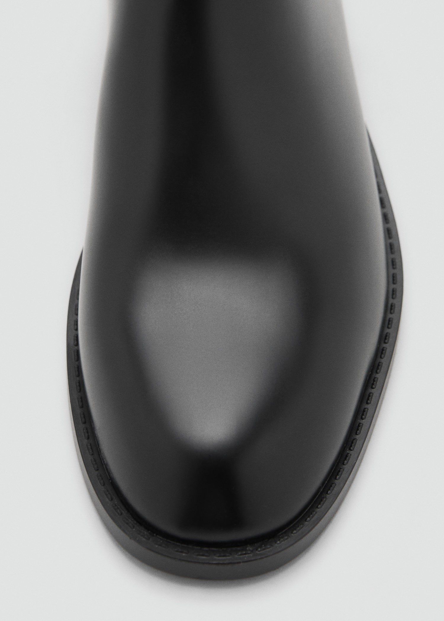 Ankle boots with elastic panel and