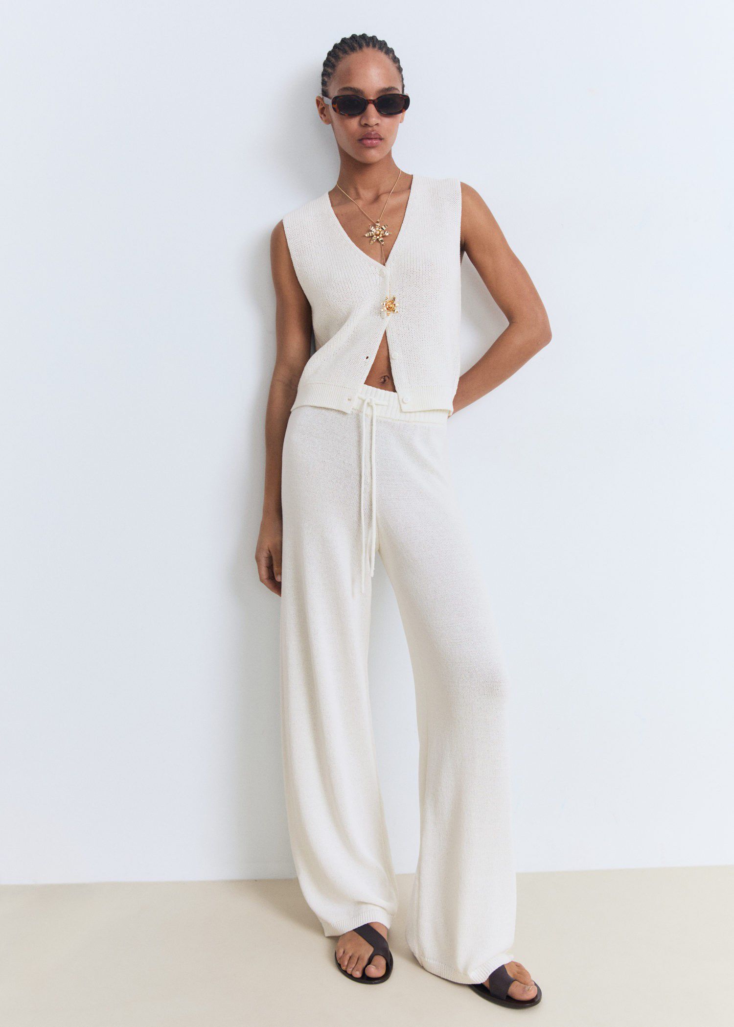 Openwork knitted waistcoat