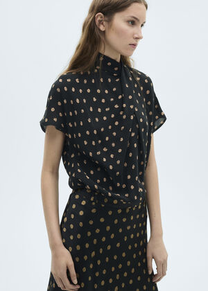 Polka dot blouse with draped collar
