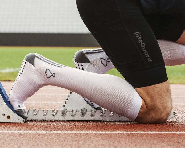 Shin-Tech Grip løbestrømper