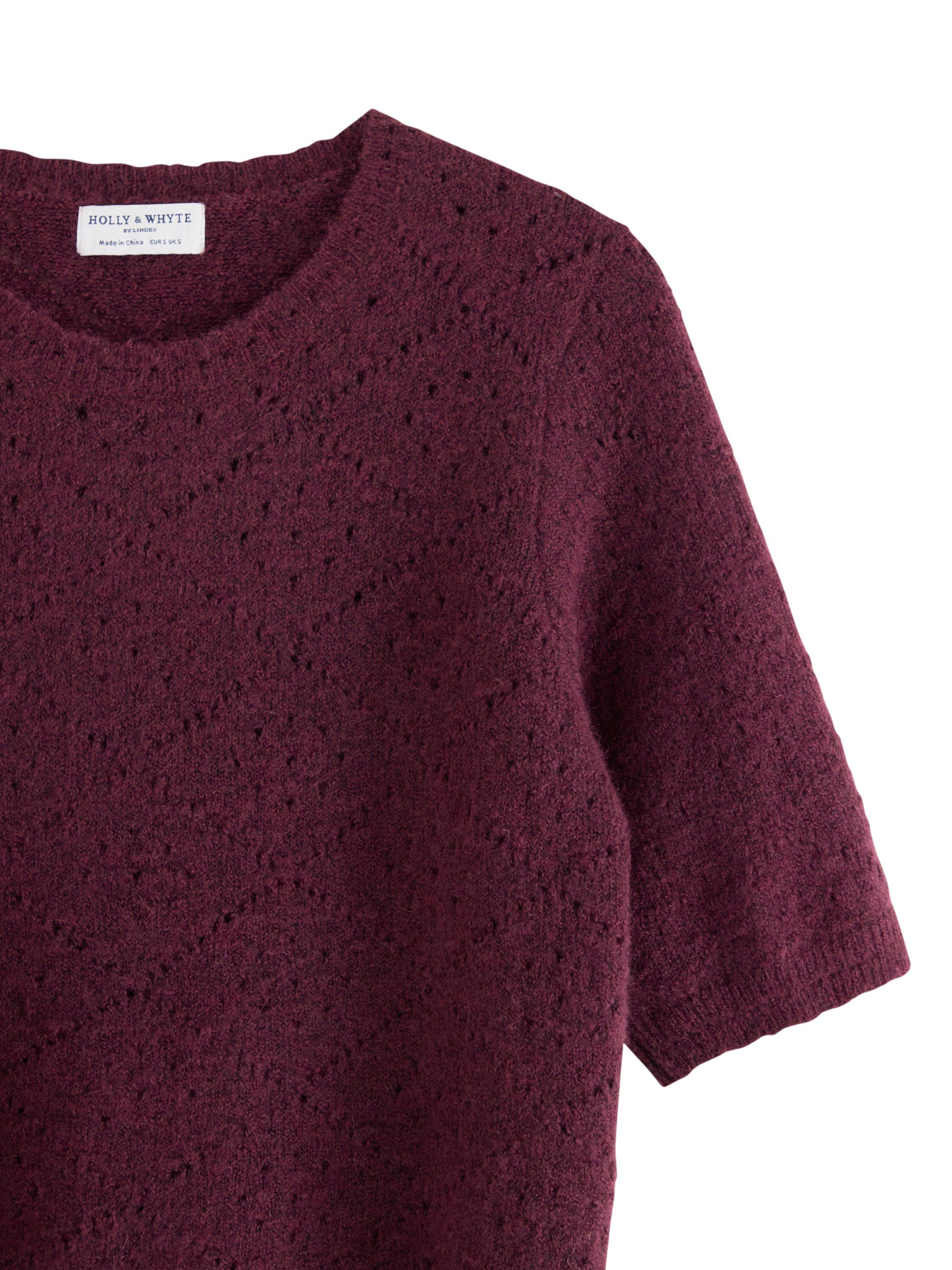 Mjuk, kort&auml;rmad tr&ouml;ja med ett hel