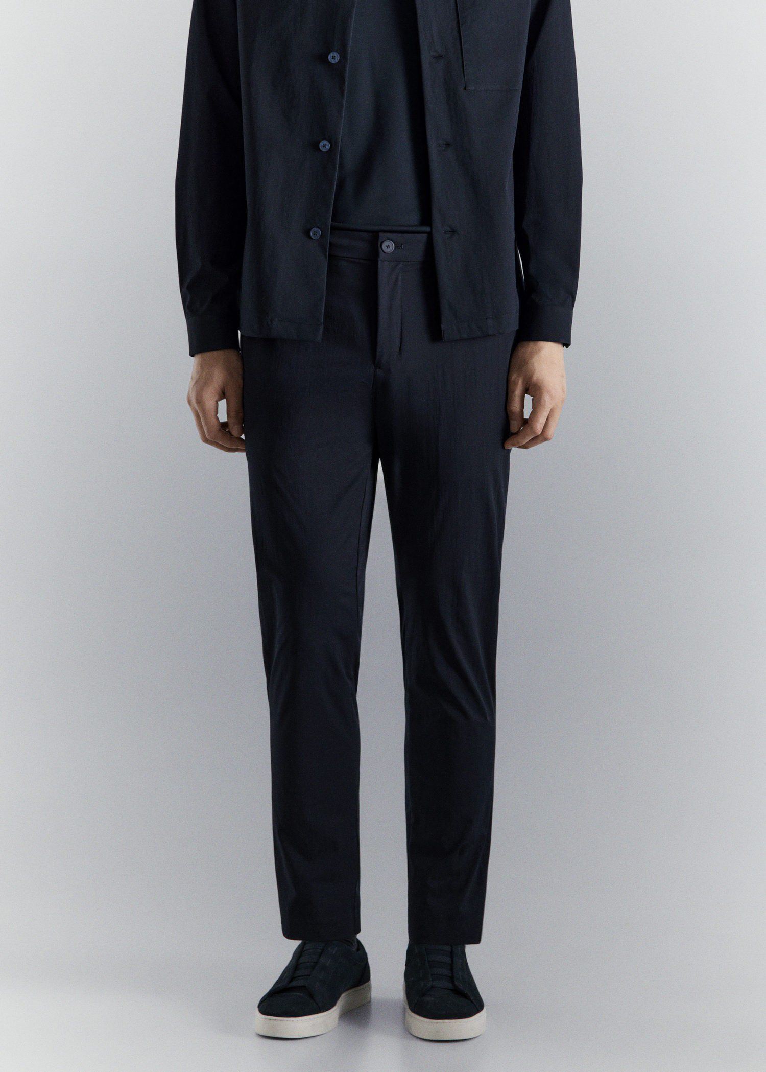 Stretch fabric slim-fit trousers wi