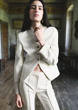Jacket with jewel-button strip coll