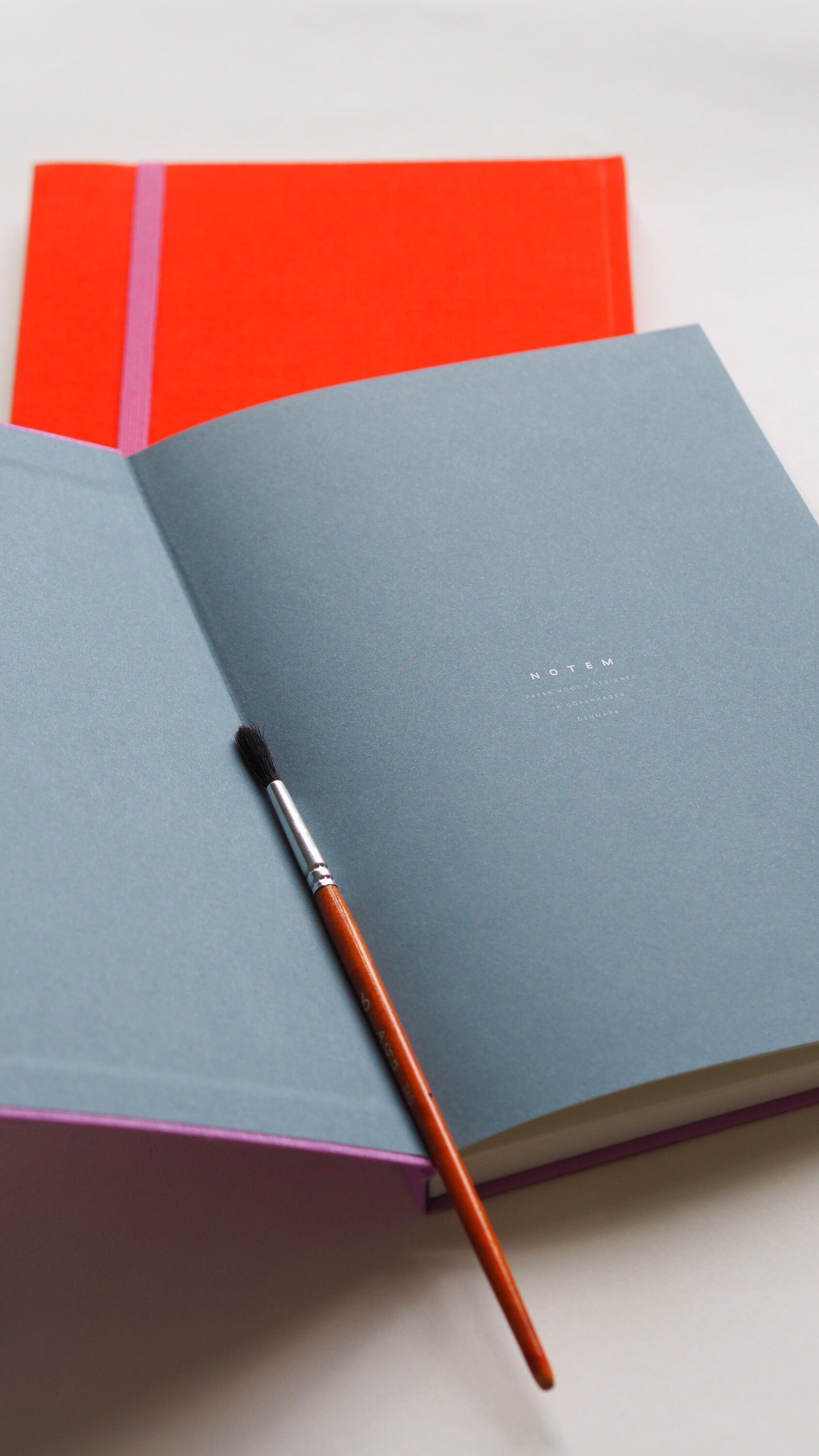 BEA notebook with elastic band