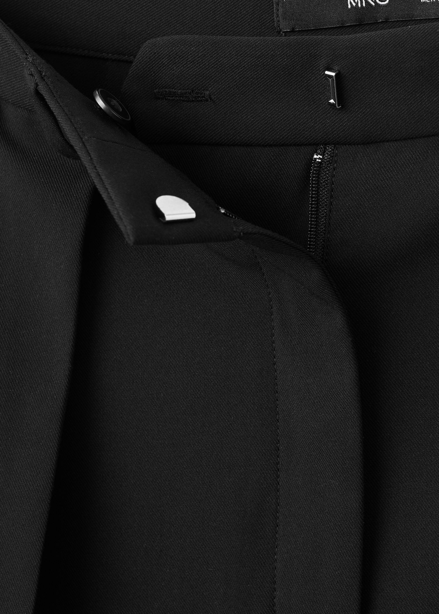 Wide-leg mid-rise pleated trousers