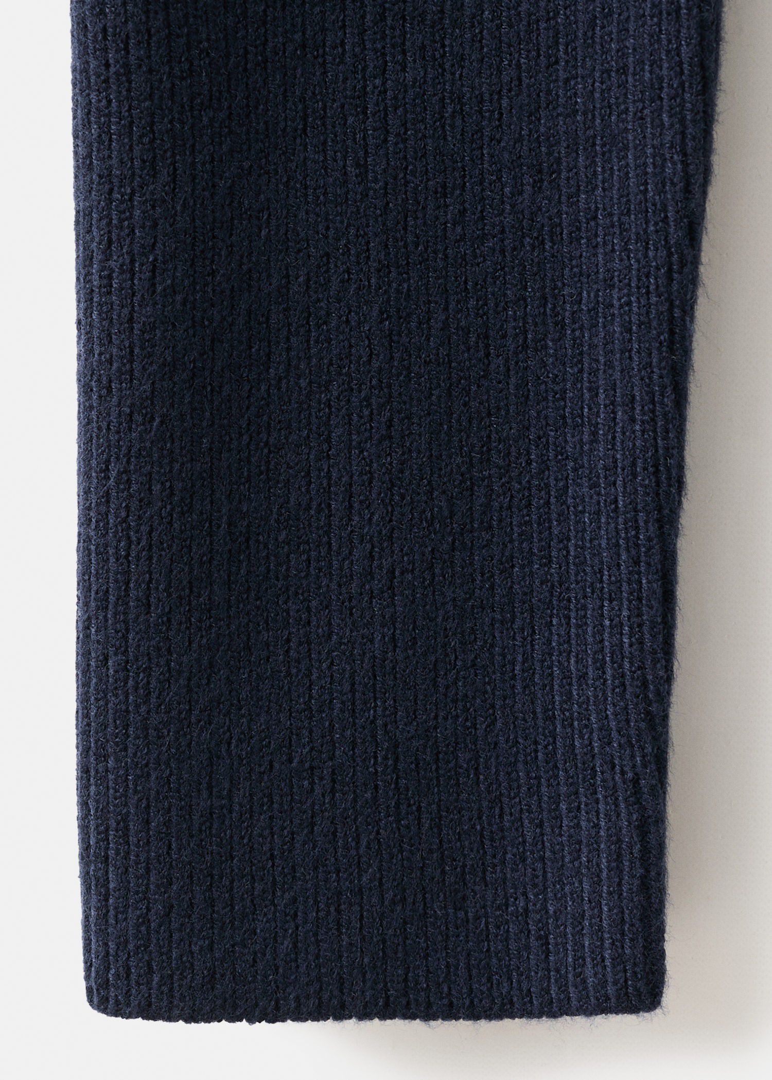 Sweater with asymmetrical roll neck