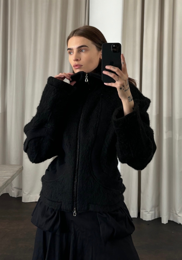 kvinde tager billede i spejl